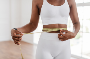 Motivated individual consulting with a board-certified physician about the 3-month Medical Weight Loss Program at Fleur-De-Lis Aesthetics.