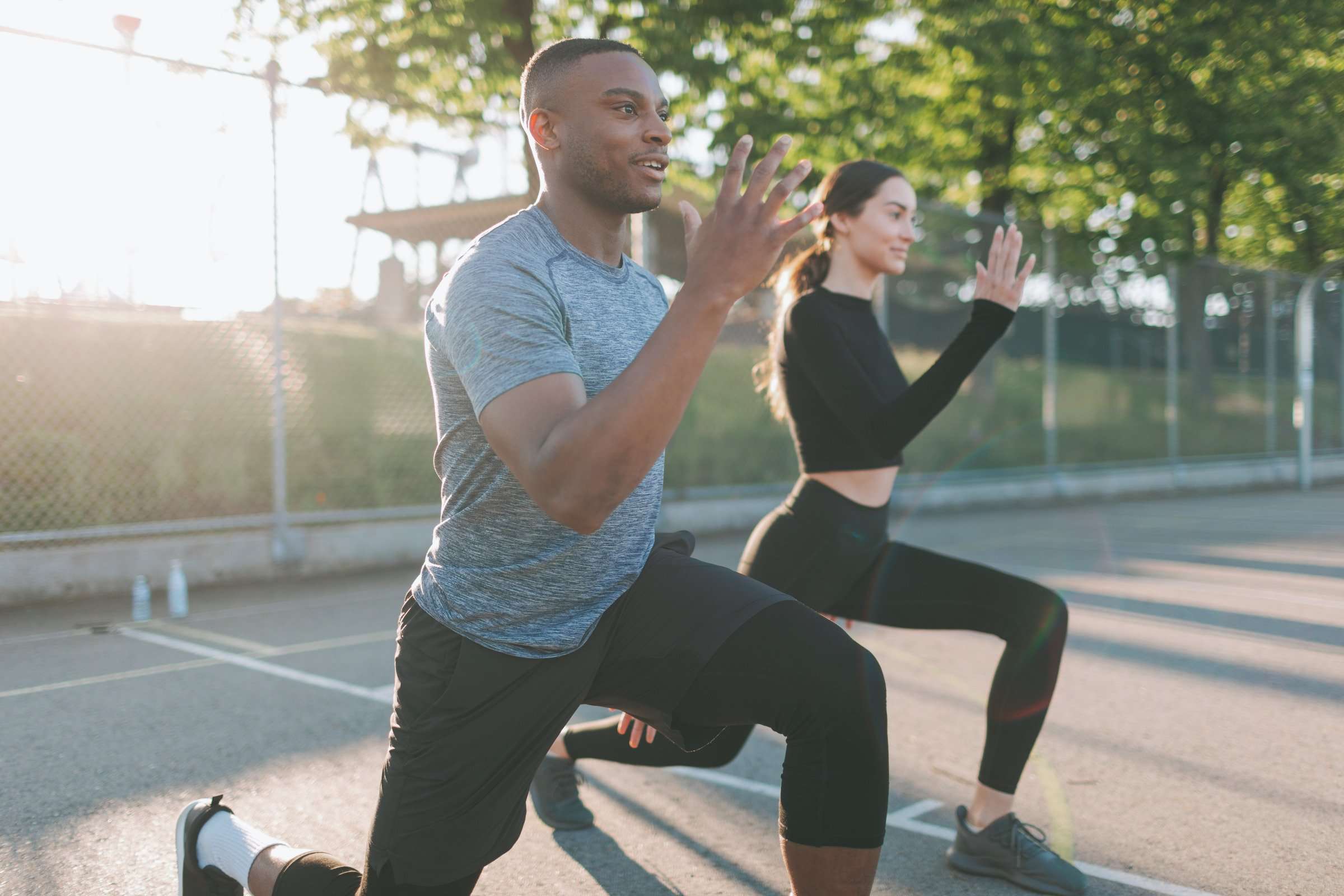 woman and man working out Fleur-De-Lis Aesthetics Medical Weight Loss Program
